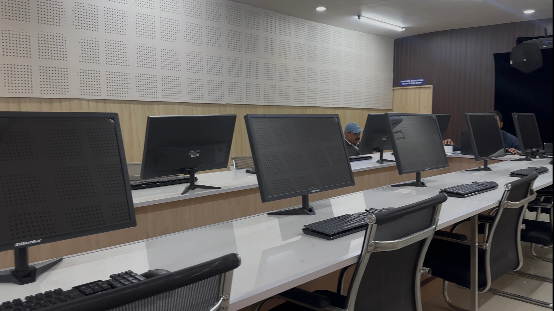 The ICE computer laboratory seen down its length, students working at the far end